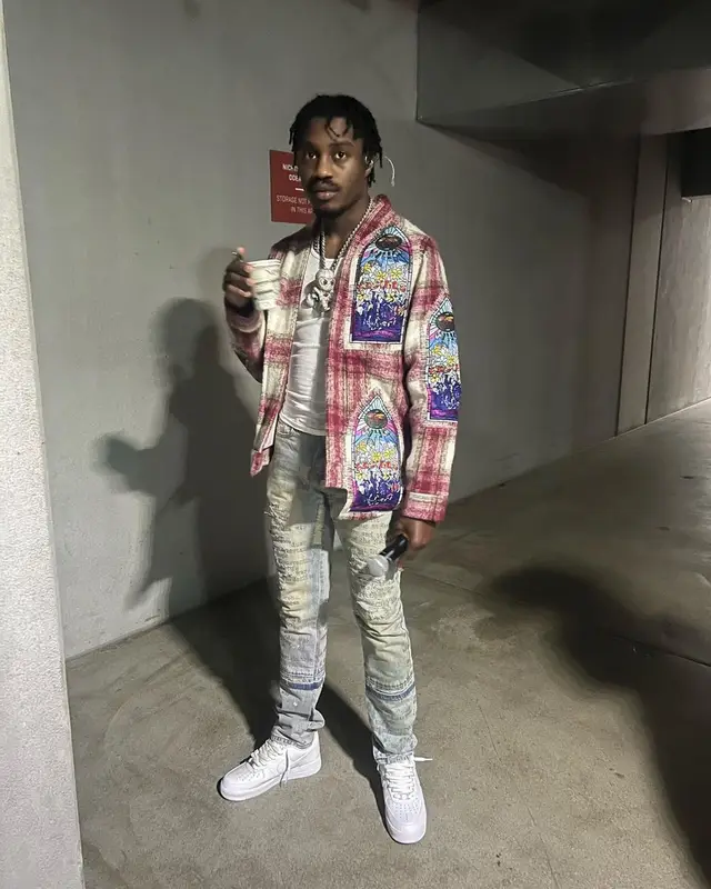 Lil Tjay outfit in Who Decides War and Nike, 2023