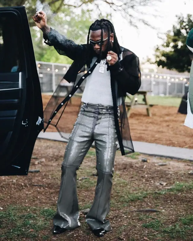 Burna Boy outfit in Rick Owens, Celine, and Balenciaga, 2023