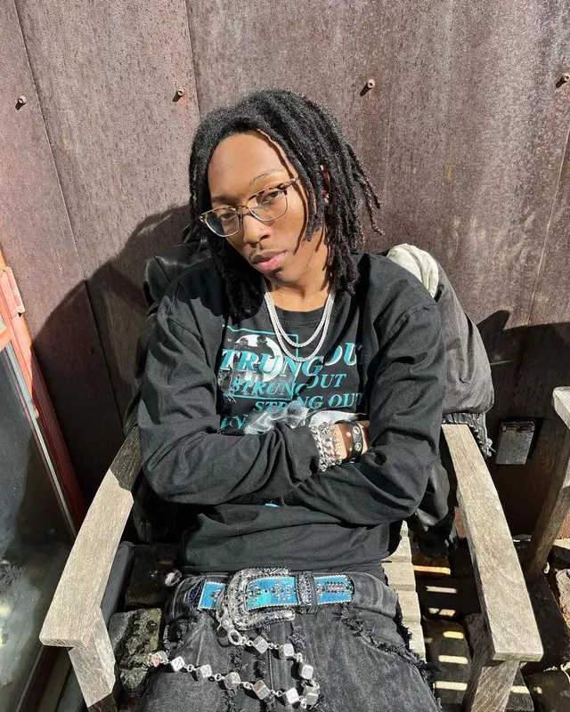 Lil Tecca outfit in Enfants Riches Deprimes, B.B. Simon, and Ray-Ban, 2023
