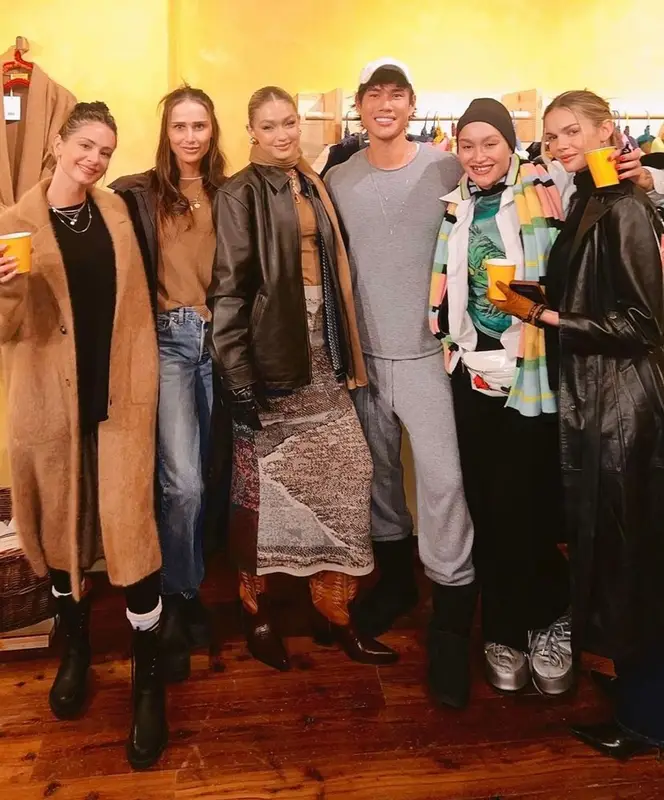 Gigi Hadid outfit in Paris Texas, Miu Miu, and Guest In Residence, 2022