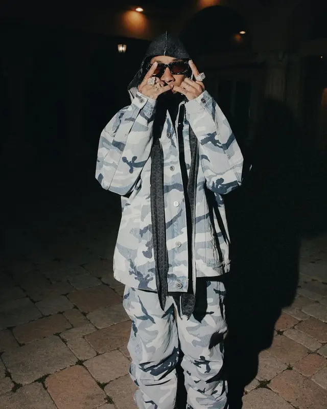 Tyga outfit in Vetements, Timberland, and Prada, 2023