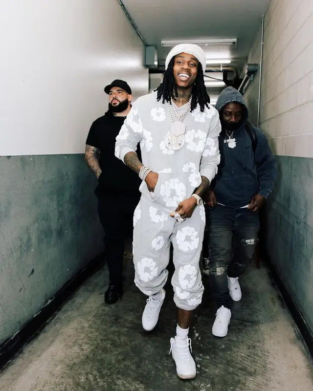 Polo G outfit in Denim Tears, Jordan, and OVO, 2023