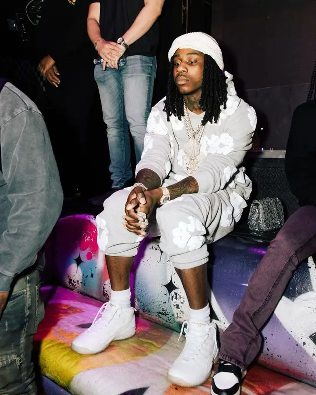 Polo G outfit in Denim Tears, Jordan, and OVO, 2023