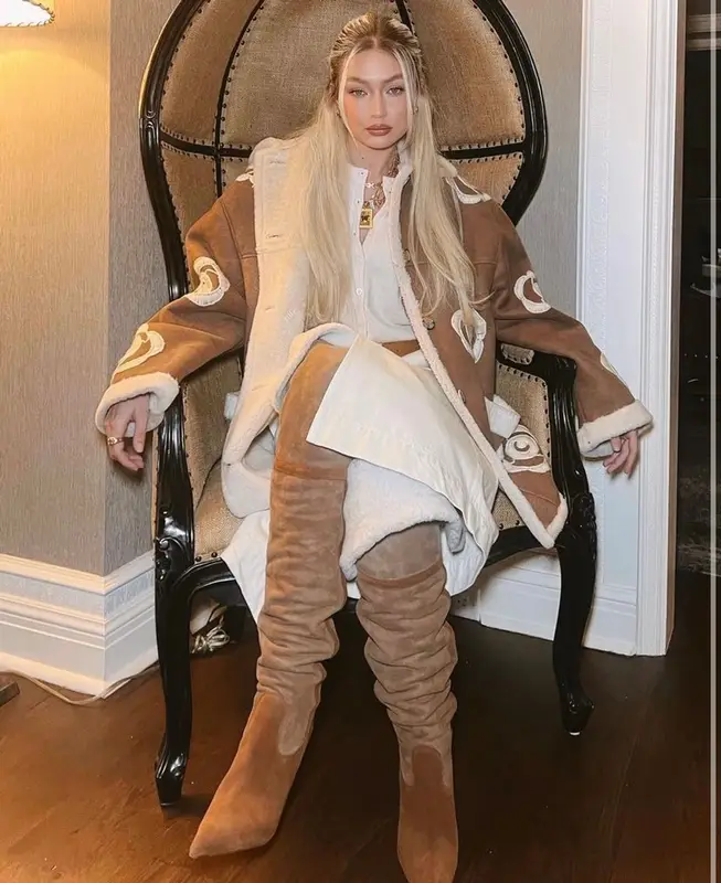 Gigi Hadid outfit in Magda Butrym and Guest In Residence, 2022