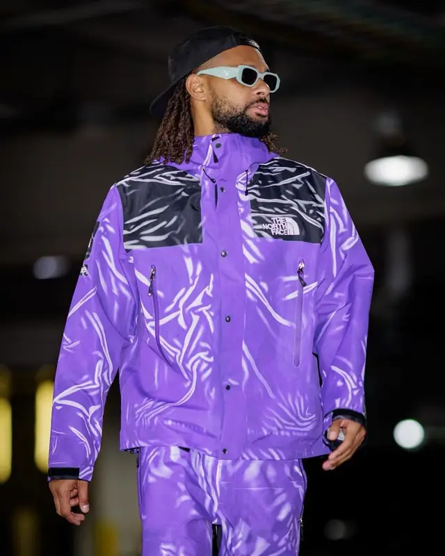 Patty Mills outfit in Supreme, Prada, and The North Face, 2023