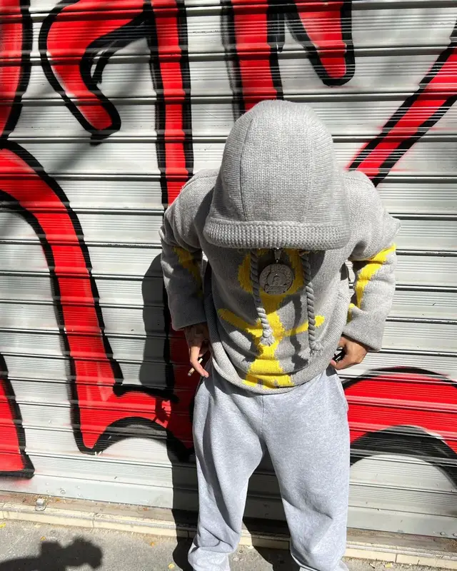 Zola outfit in JW Anderson, Nike, and Dior, 2023