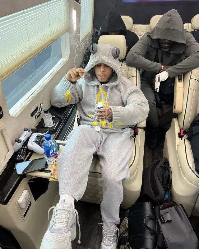 Zola outfit in JW Anderson, Nike, and Dior, 2023