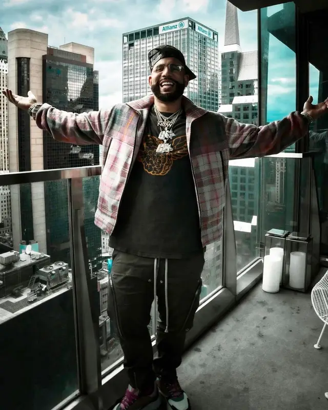 DJ Drama outfit in Dior, Gallery Dept., and Amiri, 2023