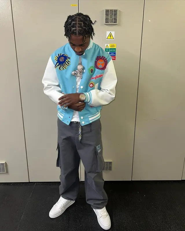 Lil Tjay outfit in Louis Vuitton and Yayoi Kusama, 2023