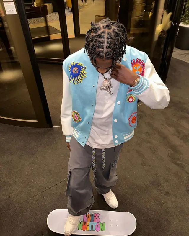 Lil Tjay outfit in Louis Vuitton and Yayoi Kusama, 2023