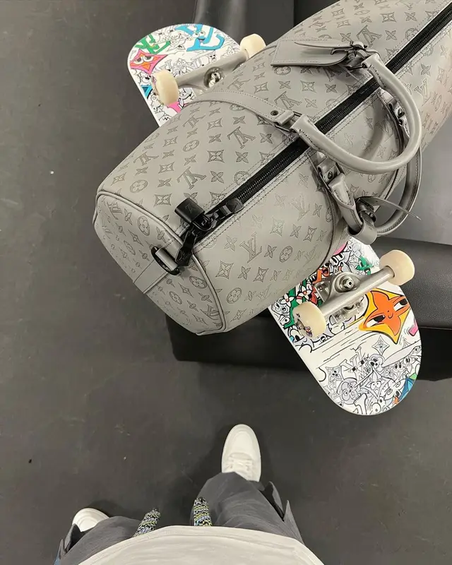 Lil Tjay outfit in Louis Vuitton and Yayoi Kusama, 2023