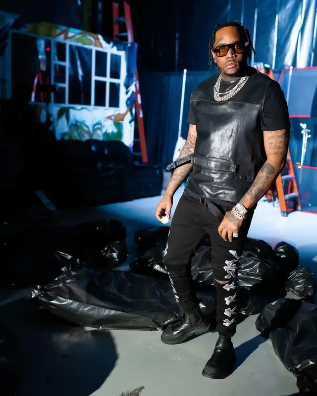 Fivio Foreign outfit in Amiri, Alexander McQueen, and Prada, 2023