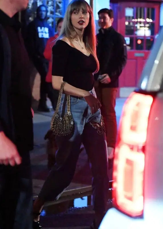 Taylor Swift outfit in Area, Paco Rabanne, and Sam Edelman, 2023