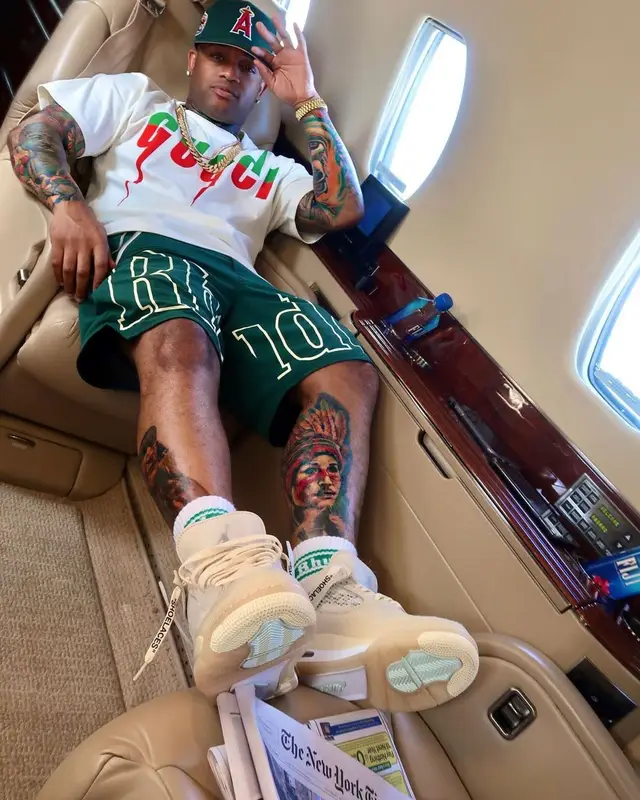 Conceited outfit in Gucci, New Era, and Rhude, 2020
