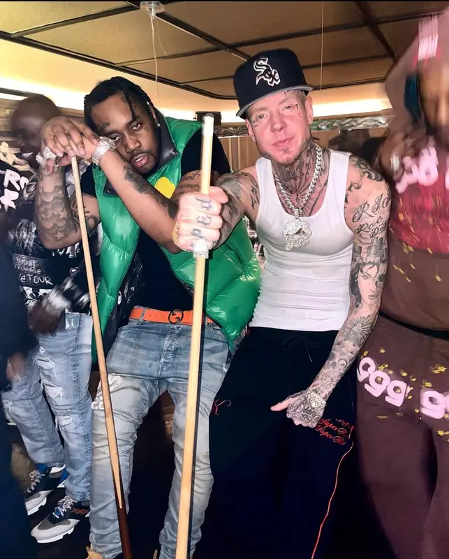 Fivio Foreign outfit in Moncler, Amiri, and Gucci, 2023