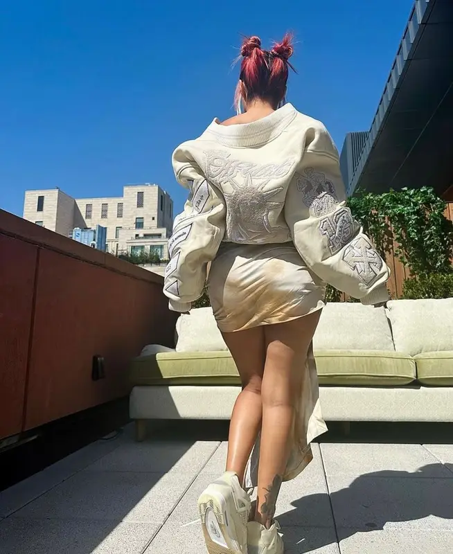 Karol G outfit in Off-White and Jordan, 2023