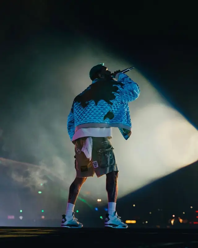 Chris Brown outfit in Who Decides War, Bottega Veneta, and Prada, 2023