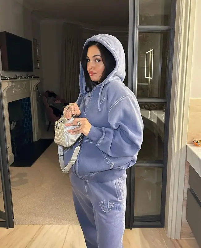 Mabel outfit in Supreme, Chanel, and True Religion, 2023