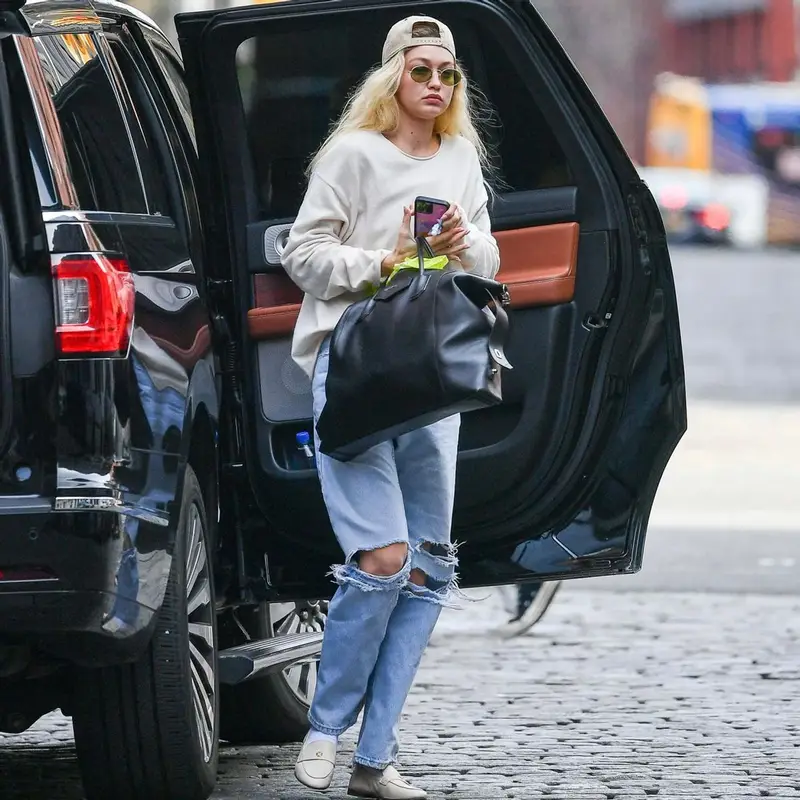 Gigi Hadid outfit in Guest In Residence, Givenchy, and Tejesta, 2023