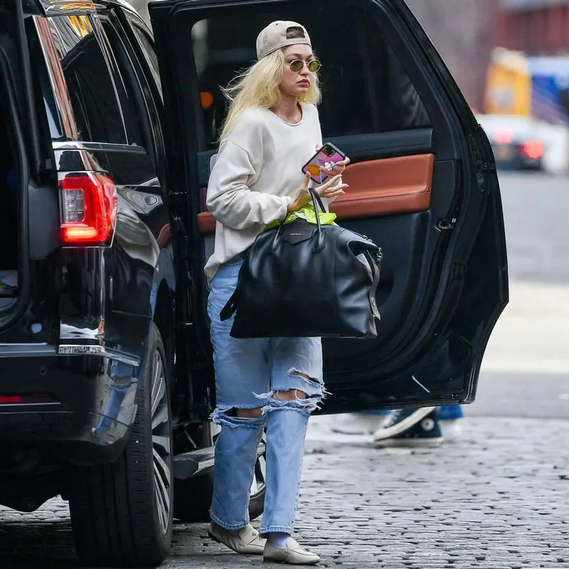 Gigi Hadid outfit in Guest In Residence, Givenchy, and Tejesta, 2023