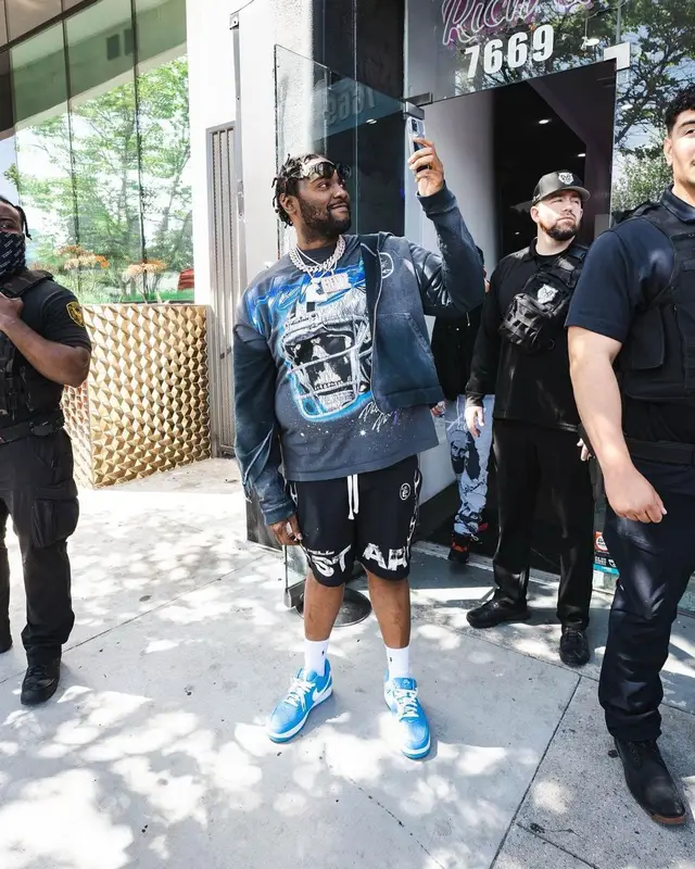 Peezy outfit in Nike, Versace, and Ralph Lauren, 2023