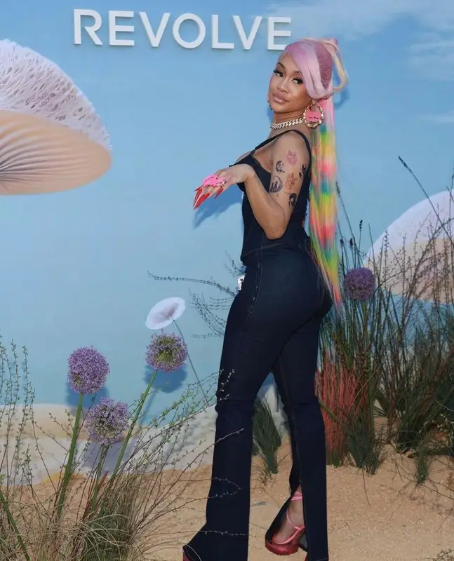 Saweetie outfit in EB Denim and Judith Leiber Couture, 2023