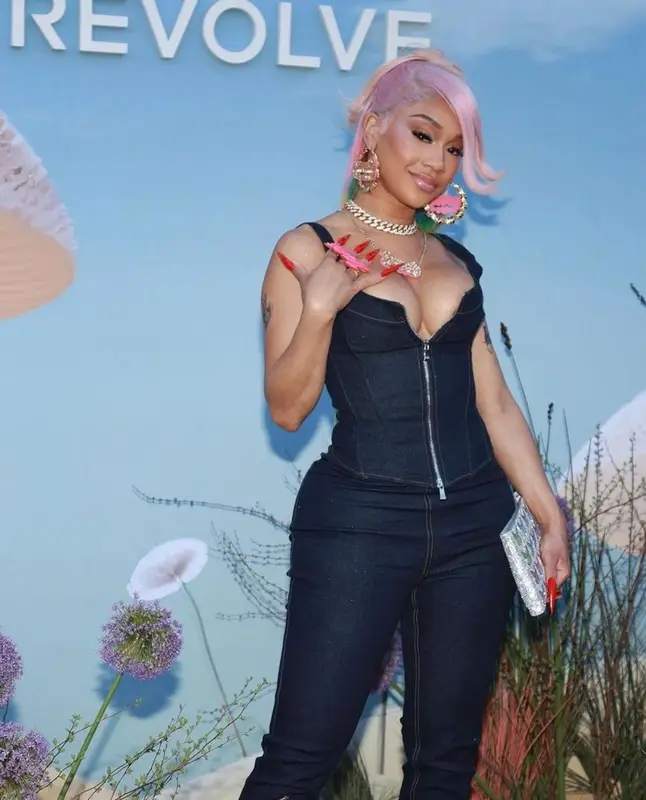 Saweetie outfit in EB Denim and Judith Leiber Couture, 2023