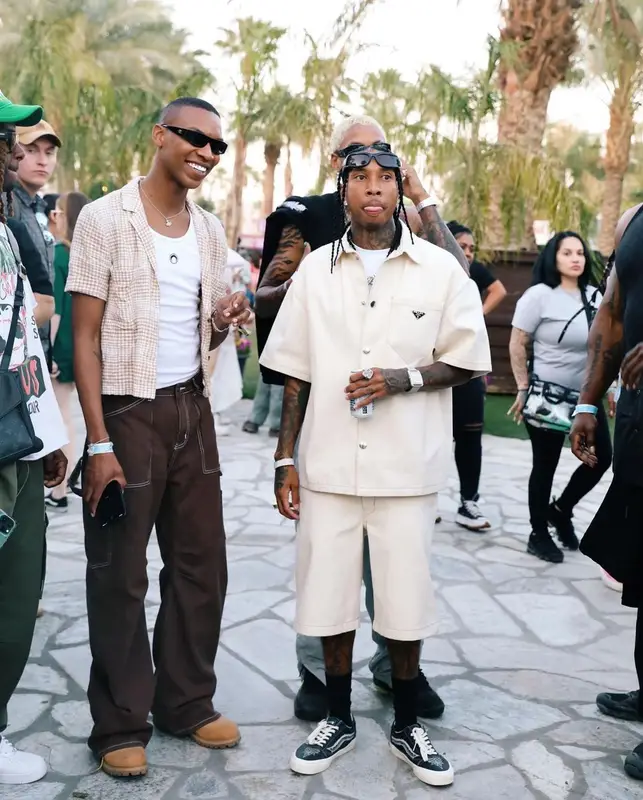Tyga outfit in Prada, Vault by Vans, and Shane Gonzales, 2023