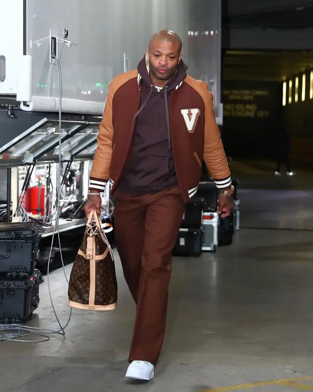 PJ Tucker outfit in Valentino, Nike, and Louis Vuitton, 2023