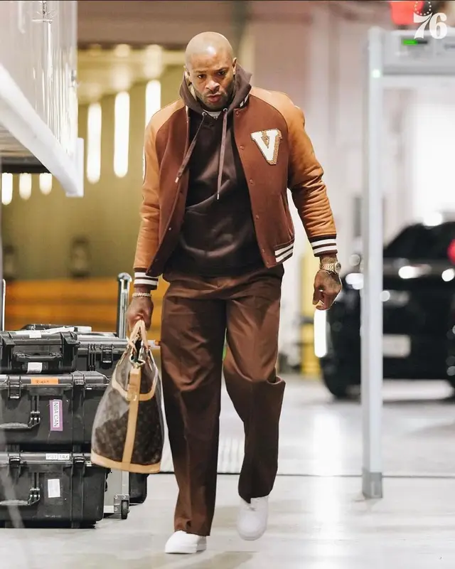 PJ Tucker outfit in Valentino, Nike, and Louis Vuitton, 2023