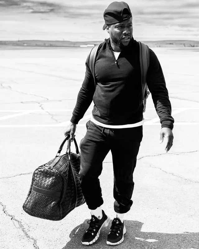 Kevin Hart outfit in Fabletics, Nike, and Bottega Veneta, 2023