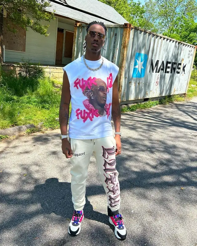 Yung Mal outfit in Lux Apparel, Dior, and Cartier, 2023