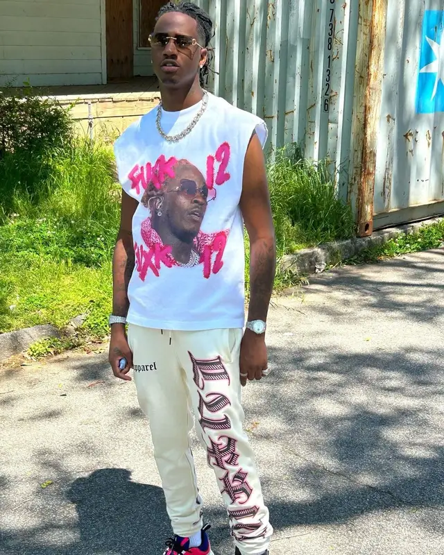 Yung Mal outfit in Lux Apparel, Dior, and Cartier, 2023