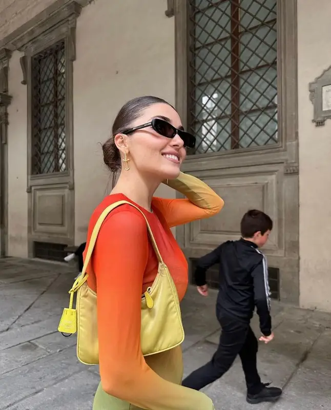 Hande Erchel outfit in Prada, Saint Laurent, and Self-Portrait, 2023