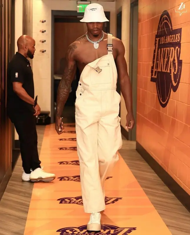 Lonnie Walker IV outfit in Prada, Marni, and Supreme, 2023