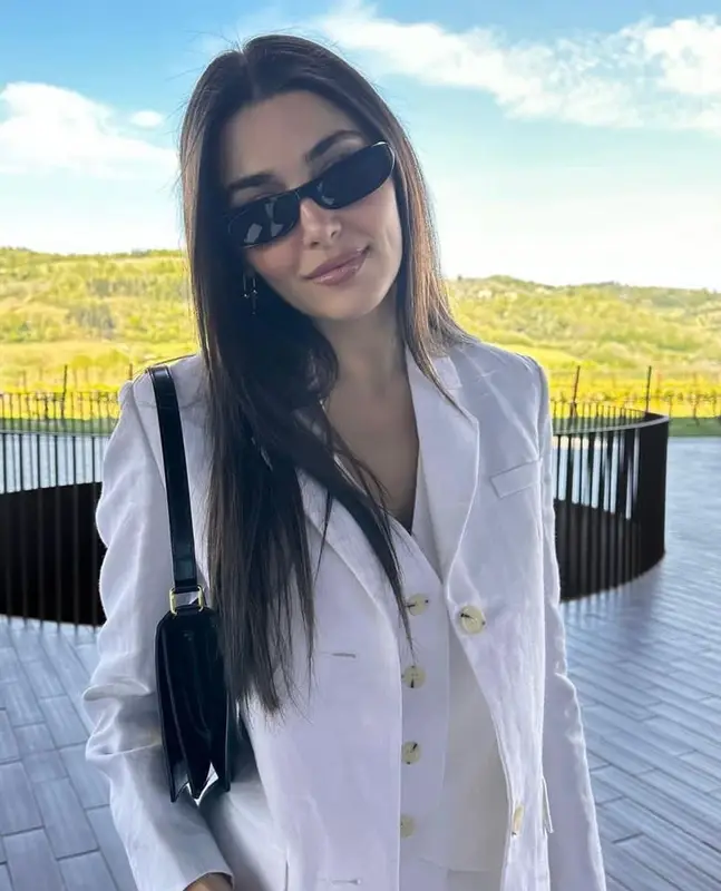 Hande Erchel outfit in Prada, Celine, and Saint Laurent, 2023