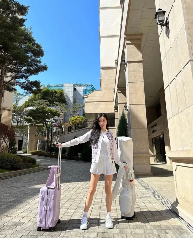 Tiffany Young outfit in Rimowa, Nike, and FairLiar, 2023