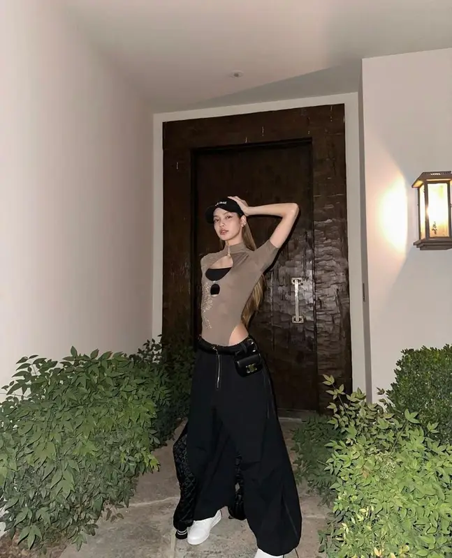 Lisa outfit in Poster Girl, Dion Lee, and Celine, 2023