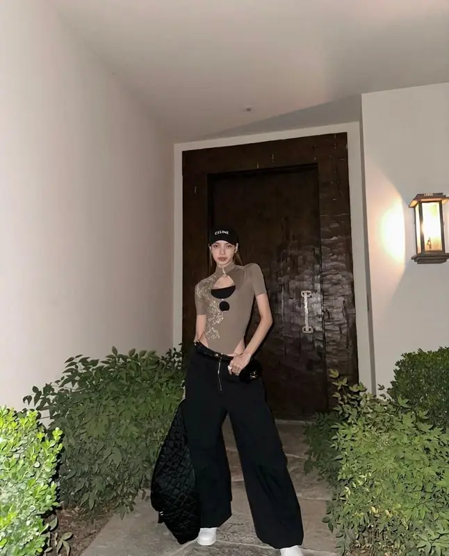 Lisa outfit in Poster Girl, Dion Lee, and Celine, 2023