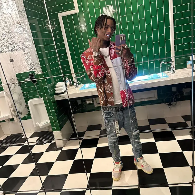 Soulja Boy outfit in KidSuper, Purple Brand, and Dior, 2023