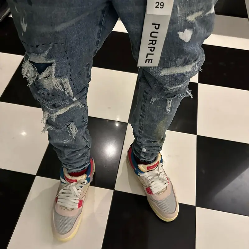 Soulja Boy outfit in KidSuper, Purple Brand, and Dior, 2023