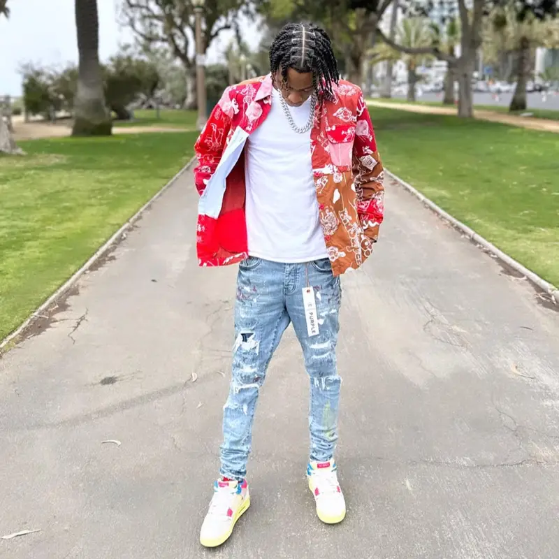 Soulja Boy outfit in KidSuper, Purple Brand, and Dior, 2023