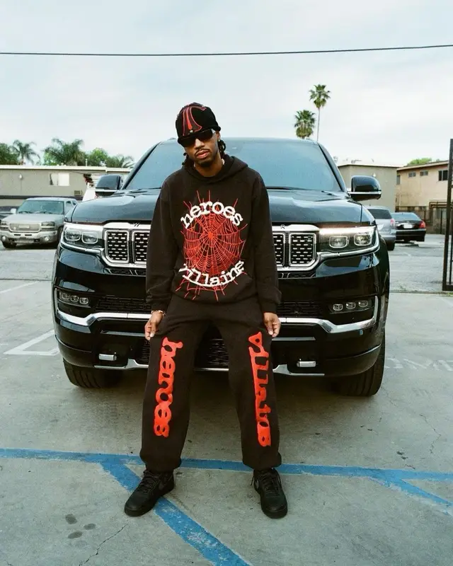Metro Boomin outfit in Spider Worldwide, Chrome Hearts, and Metro Boomin Merch, 2023