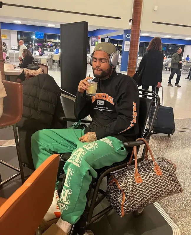 Dave East outfit in Balenciaga, Goyard, and Apple, 2023