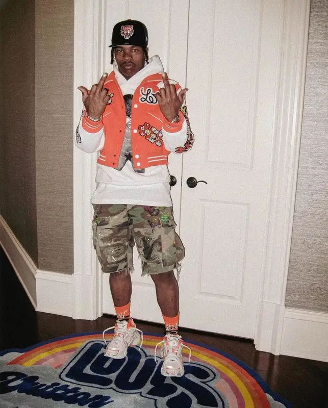 Lil Baby outfit in Louis Vuitton, Sicko, and New Era, 2023