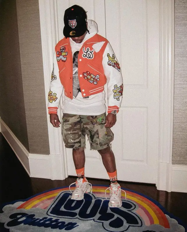 Lil Baby outfit in Louis Vuitton, Sicko, and New Era, 2023