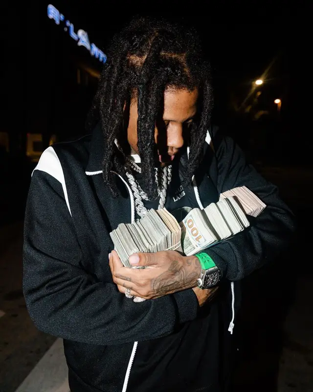 Lil Durk outfit in Amiri and Goyard, 2023