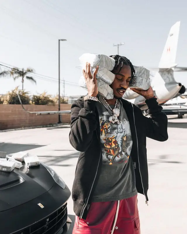 Lil Tjay outfit in Rick Owens, Cartier, and Icebox, 2023