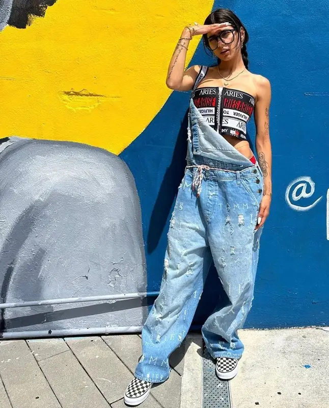 Mia Khalifa outfit in Tommy Hilfiger, Vans, and Aries, 2023