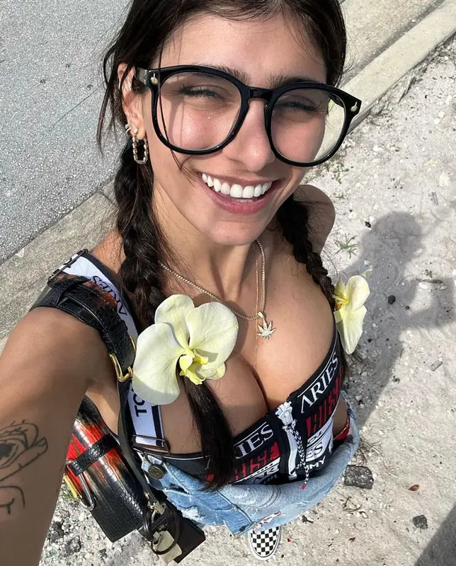 Mia Khalifa outfit in Tommy Hilfiger, Vans, and Aries, 2023